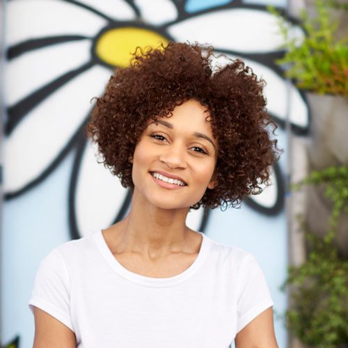 outdoor-head-and-shoulders-portrait-of-smiling-GWFXMSP.jpg